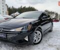 Чорний Хендай Елантра, об'ємом двигуна 2 л та пробігом 114 тис. км за 13999 $, фото 1 на Automoto.ua