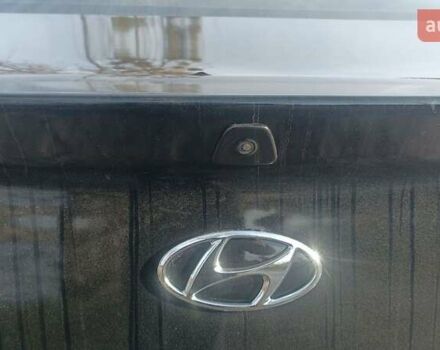 Черный Хендай Элантра, объемом двигателя 1.59 л и пробегом 98 тыс. км за 13800 $, фото 1 на Automoto.ua