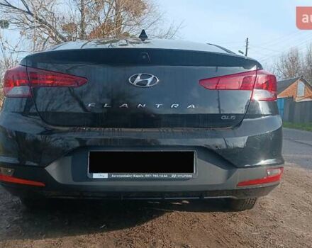 Черный Хендай Элантра, объемом двигателя 1.59 л и пробегом 98 тыс. км за 13800 $, фото 2 на Automoto.ua