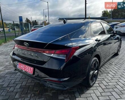Чорний Хендай Елантра, об'ємом двигуна 2 л та пробігом 126 тис. км за 12700 $, фото 3 на Automoto.ua