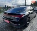Чорний Хендай Елантра, об'ємом двигуна 2 л та пробігом 126 тис. км за 12700 $, фото 3 на Automoto.ua