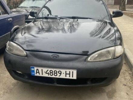 Черный Хендай Элантра, объемом двигателя 1.8 л и пробегом 400 тыс. км за 1500 $, фото 1 на Automoto.ua