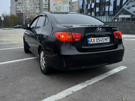 Черный Хендай Элантра, объемом двигателя 1.59 л и пробегом 255 тыс. км за 6300 $, фото 1 на Automoto.ua