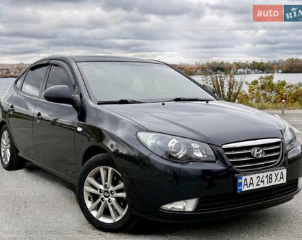 Черный Хендай Элантра, объемом двигателя 2 л и пробегом 240 тыс. км за 7850 $, фото 1 на Automoto.ua
