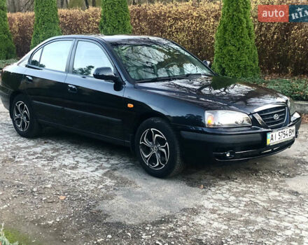 Черный Хендай Элантра, объемом двигателя 1.6 л и пробегом 66 тыс. км за 6000 $, фото 1 на Automoto.ua