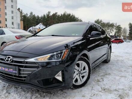 Чорний Хендай Елантра, об'ємом двигуна 2 л та пробігом 114 тис. км за 13999 $, фото 1 на Automoto.ua