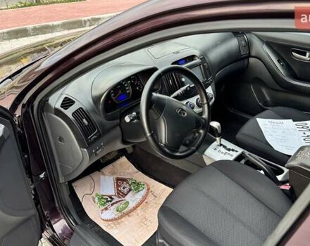 Хендай Элантра 2007 в Тернополе на Automoto.ua Фиолетовый Хендай Элантра, объемом двигателя 1.59 л и пробегом 198 тыс. км за 7299 $, фото 12 на Automoto.ua