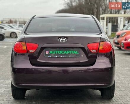 Фиолетовый Хендай Элантра, объемом двигателя 1.98 л и пробегом 322 тыс. км за 7400 $, фото 6 на Automoto.ua