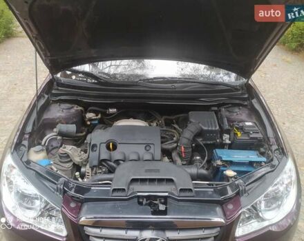 Коричневый Хендай Элантра, объемом двигателя 1.6 л и пробегом 158 тыс. км за 5500 $, фото 12 на Automoto.ua