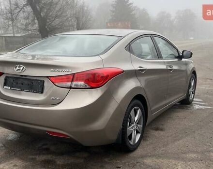 Коричневый Хендай Элантра, объемом двигателя 1.8 л и пробегом 107 тыс. км за 9800 $, фото 21 на Automoto.ua