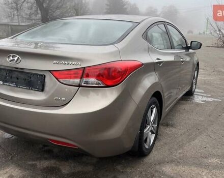 Коричневый Хендай Элантра, объемом двигателя 1.8 л и пробегом 107 тыс. км за 9800 $, фото 6 на Automoto.ua
