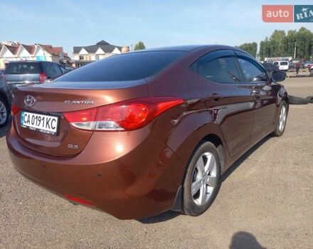 Коричневый Хендай Элантра, объемом двигателя 1.8 л и пробегом 155 тыс. км за 8000 $, фото 6 на Automoto.ua