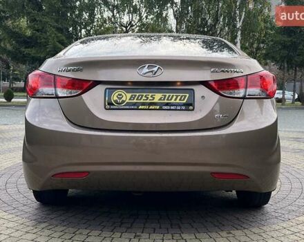 Коричневый Хендай Элантра, объемом двигателя 1.59 л и пробегом 140 тыс. км за 9700 $, фото 5 на Automoto.ua