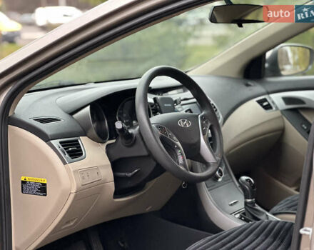 Коричневый Хендай Элантра, объемом двигателя 1.8 л и пробегом 128 тыс. км за 9500 $, фото 24 на Automoto.ua