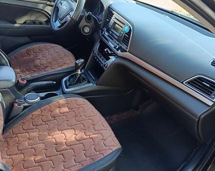 Коричневый Хендай Элантра, объемом двигателя 1.6 л и пробегом 86 тыс. км за 12300 $, фото 19 на Automoto.ua