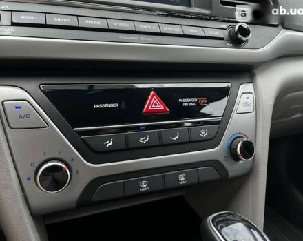 Красный Хендай Элантра, объемом двигателя 2 л и пробегом 67 тыс. км за 14000 $, фото 12 на Automoto.ua