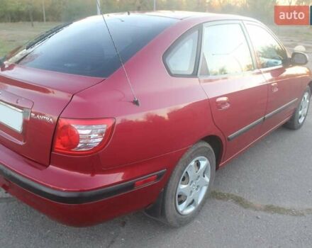 Червоний Хендай Елантра, об'ємом двигуна 2 л та пробігом 228 тис. км за 4900 $, фото 5 на Automoto.ua