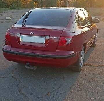 Червоний Хендай Елантра, об'ємом двигуна 2 л та пробігом 228 тис. км за 4900 $, фото 10 на Automoto.ua