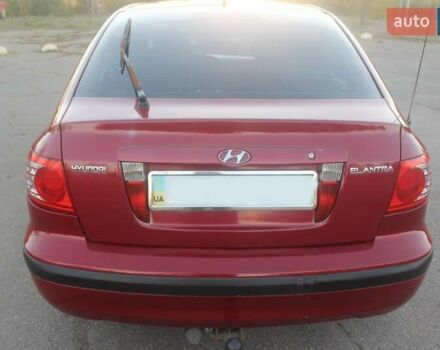 Червоний Хендай Елантра, об'ємом двигуна 2 л та пробігом 228 тис. км за 4900 $, фото 6 на Automoto.ua