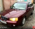 Красный Хендай Элантра, объемом двигателя 2 л и пробегом 122 тыс. км за 3000 $, фото 1 на Automoto.ua