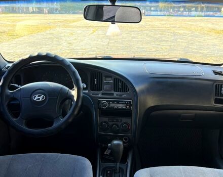 Красный Хендай Элантра, объемом двигателя 2 л и пробегом 380 тыс. км за 2800 $, фото 3 на Automoto.ua