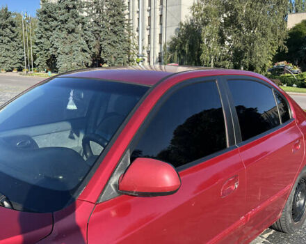 Красный Хендай Элантра, объемом двигателя 2 л и пробегом 380 тыс. км за 2800 $, фото 17 на Automoto.ua