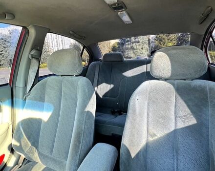 Красный Хендай Элантра, объемом двигателя 2 л и пробегом 380 тыс. км за 2800 $, фото 5 на Automoto.ua