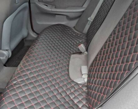 Красный Хендай Элантра, объемом двигателя 1.6 л и пробегом 200 тыс. км за 3200 $, фото 6 на Automoto.ua