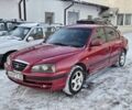 Червоний Хендай Елантра, об'ємом двигуна 2 л та пробігом 345 тис. км за 1800 $, фото 1 на Automoto.ua