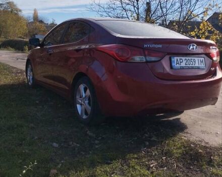 Красный Хендай Элантра, объемом двигателя 1.8 л и пробегом 195 тыс. км за 8500 $, фото 4 на Automoto.ua