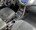 Красный Хендай Элантра, объемом двигателя 1.4 л и пробегом 62 тыс. км за 9600 $, фото 4 на Automoto.ua