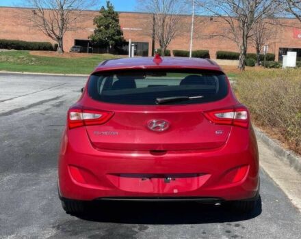 Красный Хендай Элантра, объемом двигателя 2 л и пробегом 88 тыс. км за 13550 $, фото 5 на Automoto.ua