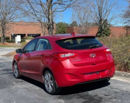 Красный Хендай Элантра, объемом двигателя 2 л и пробегом 88 тыс. км за 13550 $, фото 4 на Automoto.ua