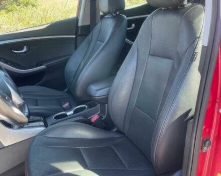 Красный Хендай Элантра, объемом двигателя 2 л и пробегом 88 тыс. км за 13550 $, фото 7 на Automoto.ua