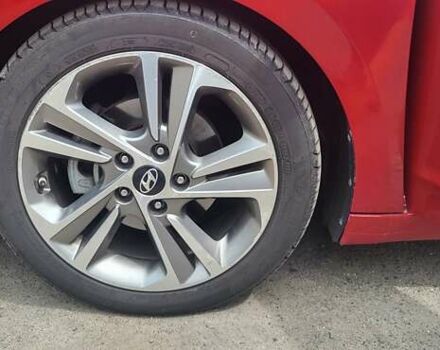 Красный Хендай Элантра, объемом двигателя 2 л и пробегом 69 тыс. км за 12000 $, фото 17 на Automoto.ua