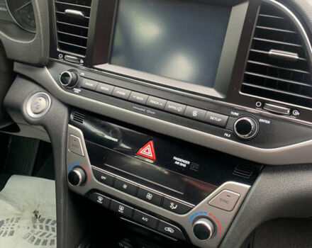 Красный Хендай Элантра, объемом двигателя 2 л и пробегом 54 тыс. км за 12300 $, фото 14 на Automoto.ua