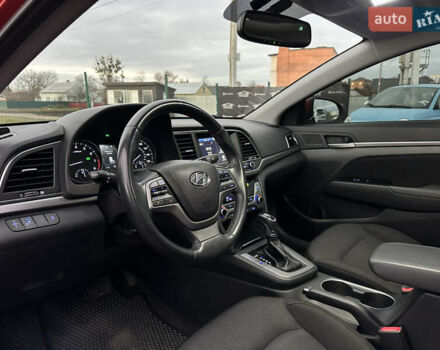 Красный Хендай Элантра, объемом двигателя 2 л и пробегом 85 тыс. км за 12000 $, фото 9 на Automoto.ua