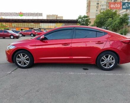 Красный Хендай Элантра, объемом двигателя 2 л и пробегом 112 тыс. км за 12600 $, фото 5 на Automoto.ua