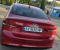 Червоний Хендай Елантра, об'ємом двигуна 2 л та пробігом 145 тис. км за 11000 $, фото 5 на Automoto.ua