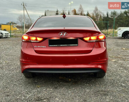 Красный Хендай Элантра, объемом двигателя 2 л и пробегом 85 тыс. км за 12000 $, фото 4 на Automoto.ua