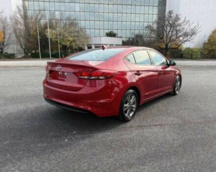 Красный Хендай Элантра, объемом двигателя 2 л и пробегом 99 тыс. км за 5900 $, фото 4 на Automoto.ua