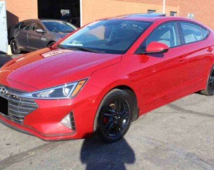 Красный Хендай Элантра, объемом двигателя 2 л и пробегом 50 тыс. км за 9400 $, фото 2 на Automoto.ua