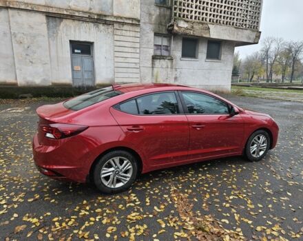 Красный Хендай Элантра, объемом двигателя 2 л и пробегом 71 тыс. км за 14600 $, фото 6 на Automoto.ua