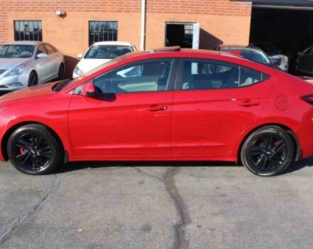 Красный Хендай Элантра, объемом двигателя 2 л и пробегом 50 тыс. км за 9400 $, фото 3 на Automoto.ua