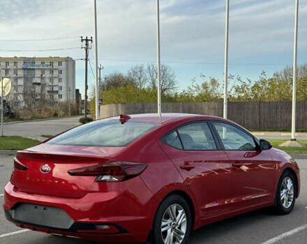 Красный Хендай Элантра, объемом двигателя 2 л и пробегом 40 тыс. км за 13200 $, фото 7 на Automoto.ua