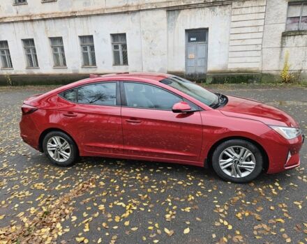 Красный Хендай Элантра, объемом двигателя 2 л и пробегом 71 тыс. км за 14600 $, фото 5 на Automoto.ua