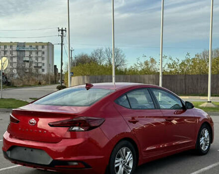 Красный Хендай Элантра, объемом двигателя 2 л и пробегом 40 тыс. км за 13200 $, фото 6 на Automoto.ua