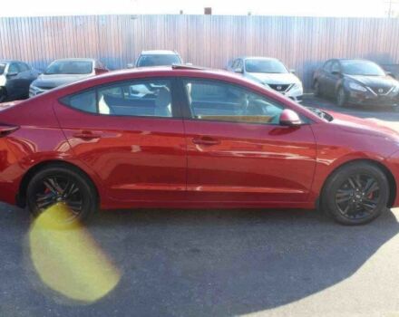 Красный Хендай Элантра, объемом двигателя 2 л и пробегом 50 тыс. км за 9400 $, фото 7 на Automoto.ua