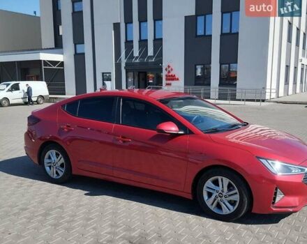 Красный Хендай Элантра, объемом двигателя 2 л и пробегом 60 тыс. км за 13600 $, фото 6 на Automoto.ua