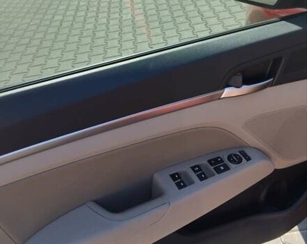 Красный Хендай Элантра, объемом двигателя 2 л и пробегом 60 тыс. км за 13600 $, фото 10 на Automoto.ua